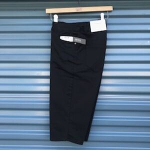 Bermuda Shorts . Size: 4 Petite Skimmer . Casual or Dress . Black . New w/ Tags